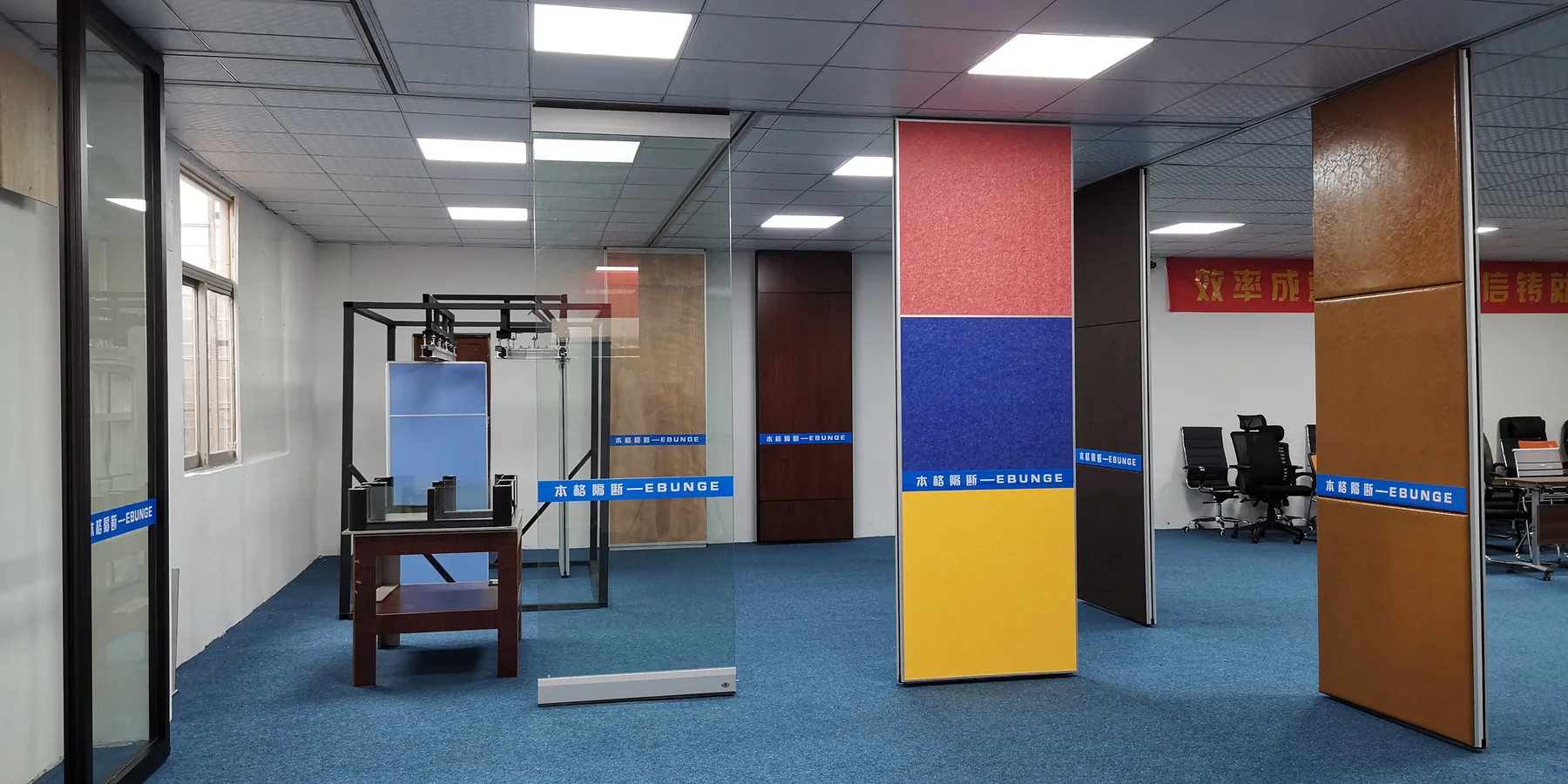 EBUNGE showroom with partition finishes and track components