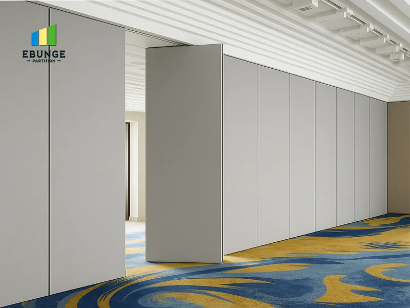 Operable wall system with overhead track and movable panels