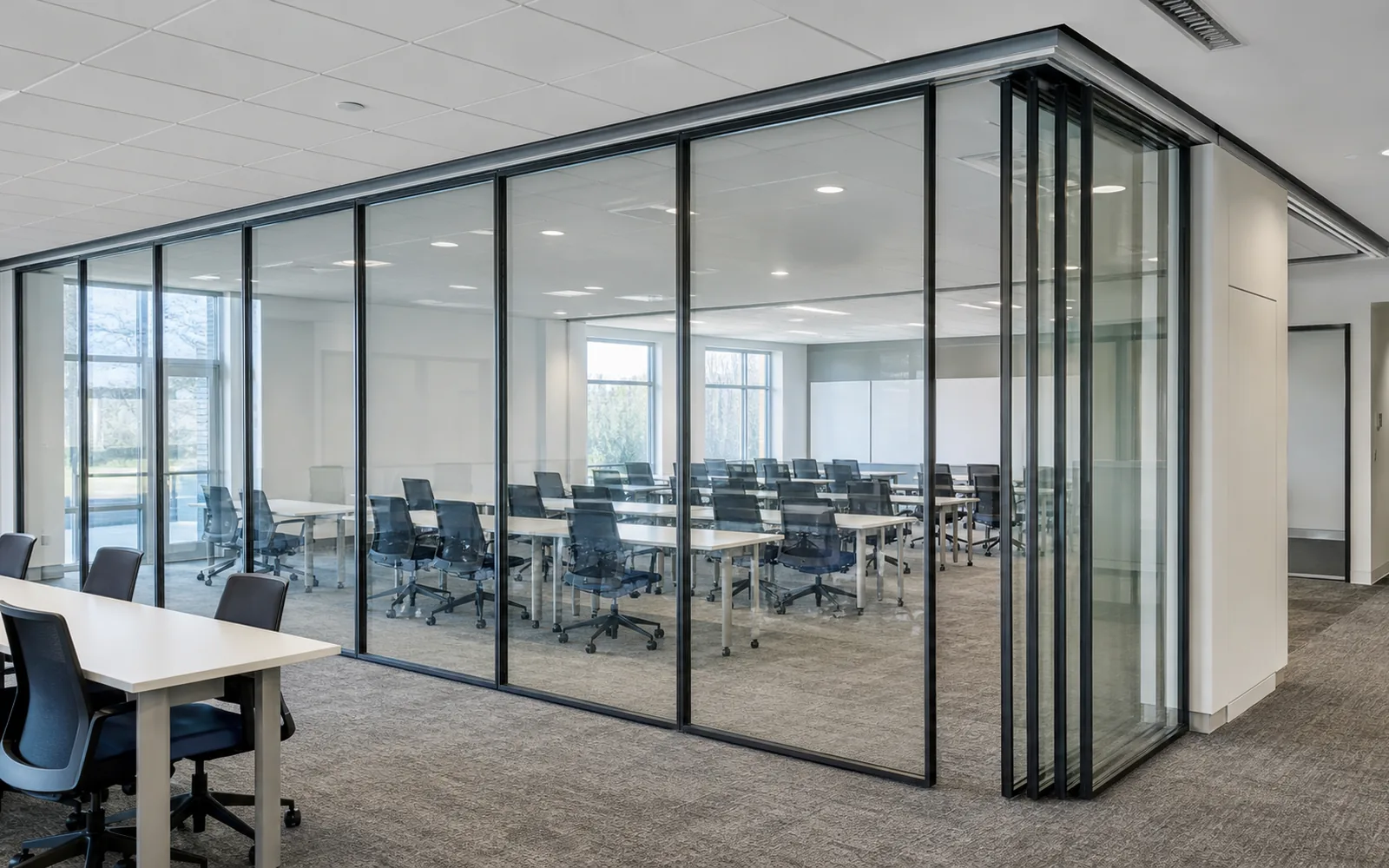 Movable glass partition wall for modern office interiors