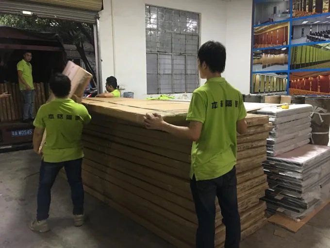 EBUNGE team preparing movable partition panels for packing
