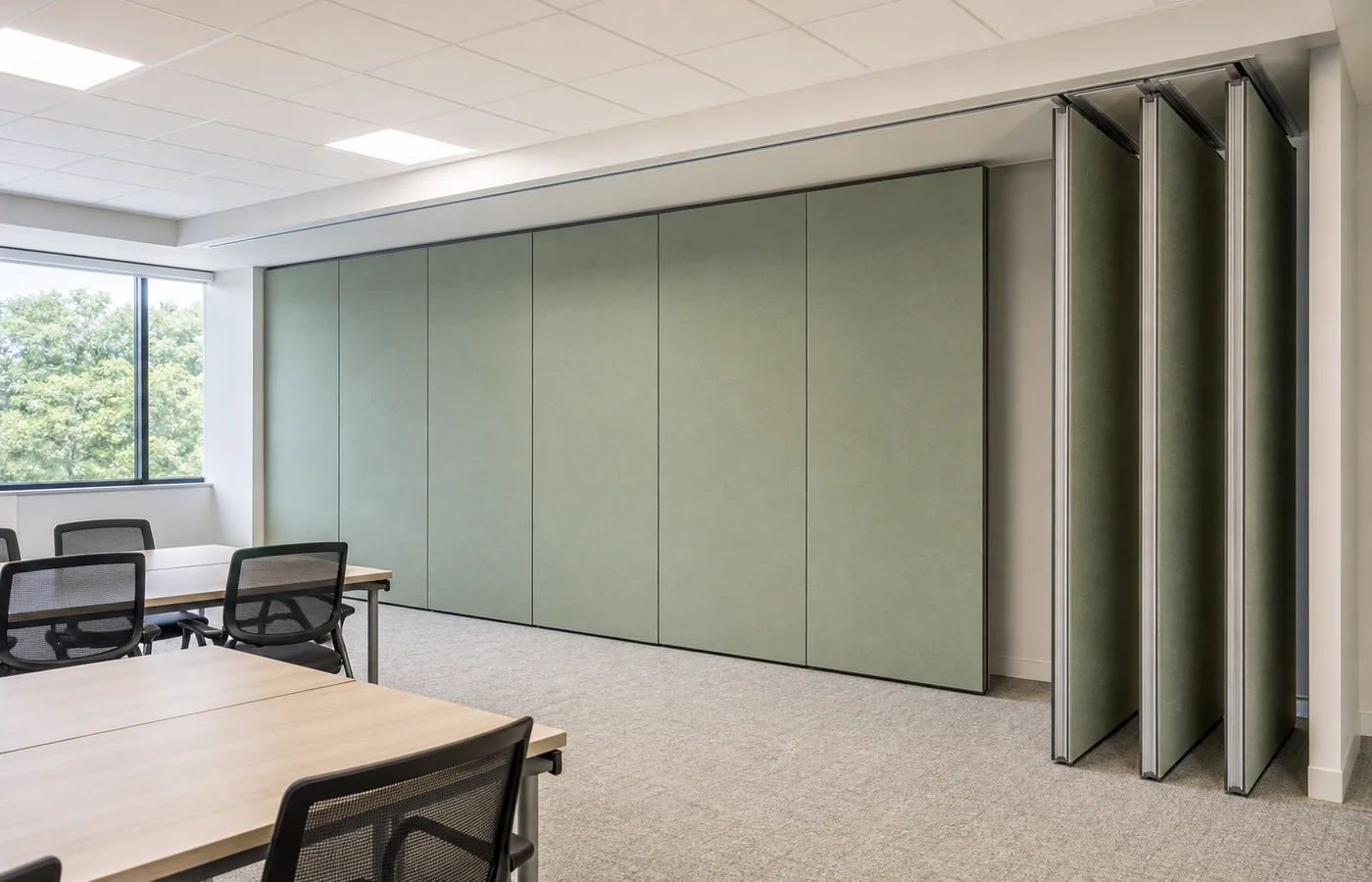 Flexible office training room with movable partition wall